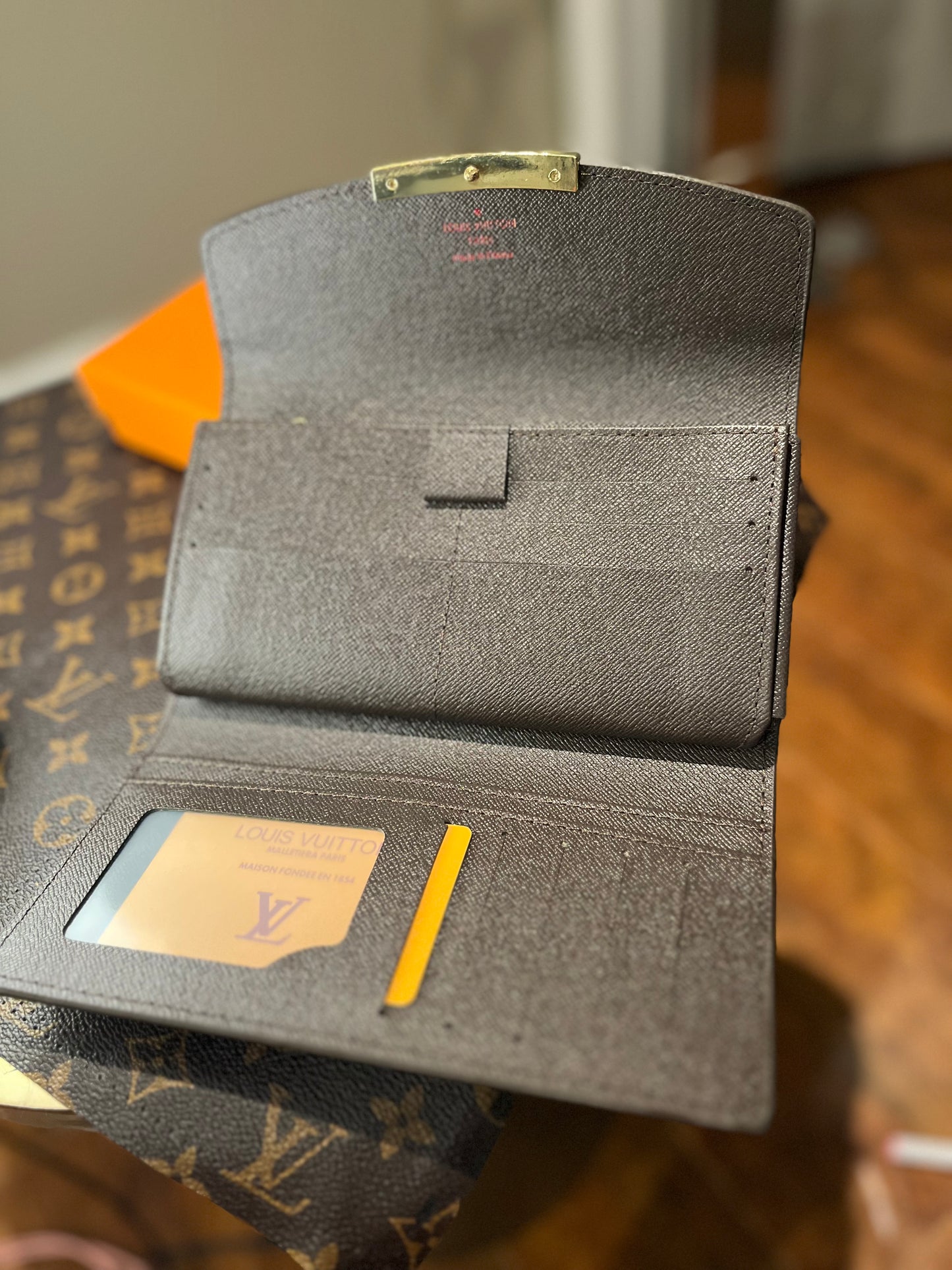 Louis Vuitton Embossed Billfold Wallet